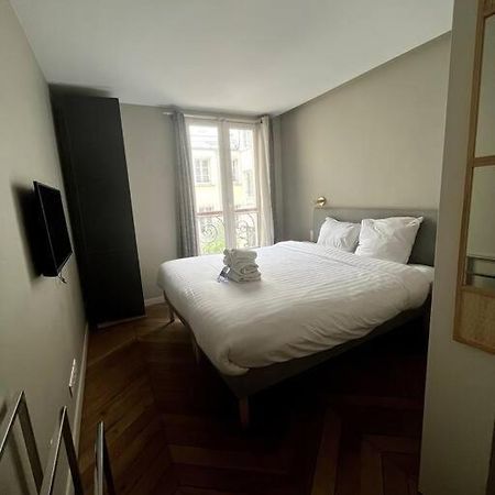 4 Personnes - St Lazar Sur Cour Apartment ปารีส ภายนอก รูปภาพ